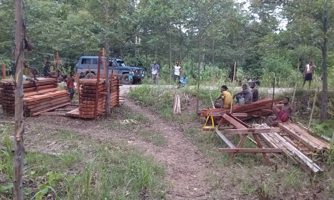 Locally prepared timber staged at the project site